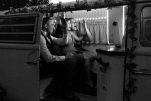 Party people making sill faces at the photo booth housed in Denver Photo Booth at a wedding